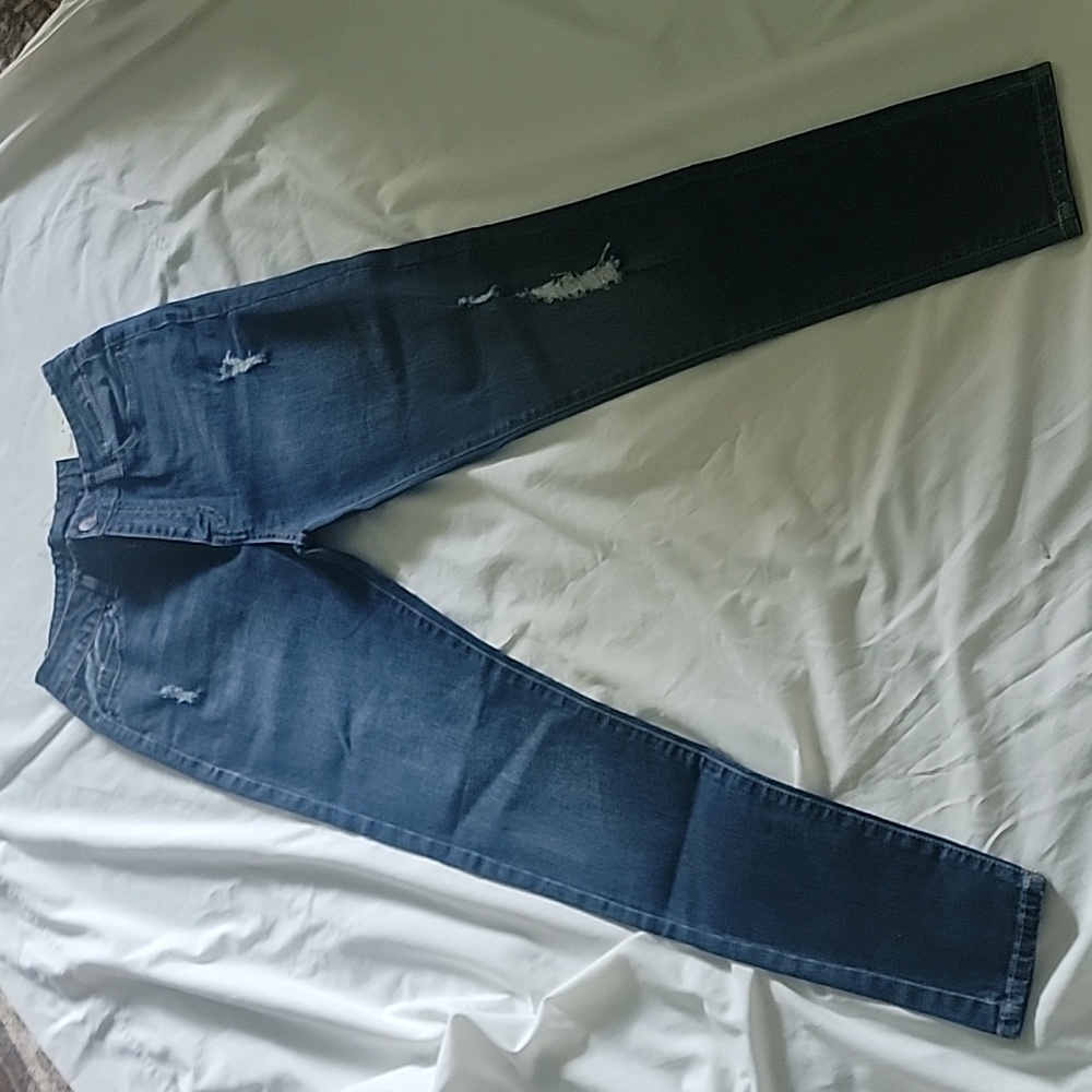 New, never worn jeans, med. Denim color. " Ci Sono" brand.